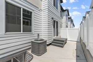 View of patio featuring central AC