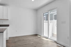 Interior space with light laminate flooring