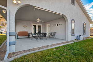 View of patio / terrace featuring french doors and ceiling fan