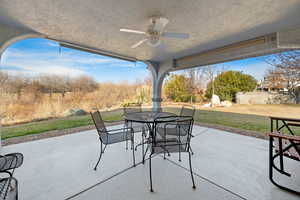 View of patio with ceiling fan