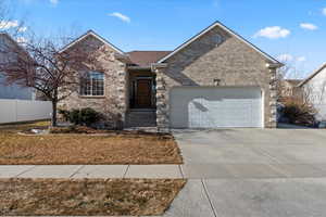 View of front of property with a garage