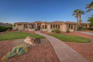 Prairie-style house with a front yard