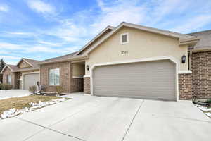 Ranch-style house with a garage