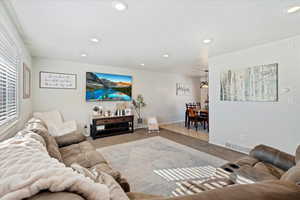 Living room with light tile patterned flooring