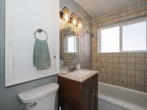 Bathroom with vanity and toilet