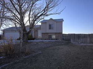 View of front facade with a garage