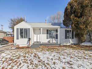 View of front of house featuring covered porch