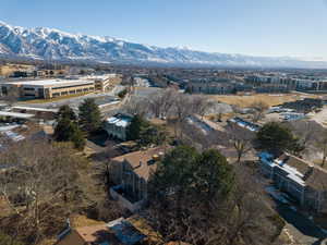 Birds eye view of property with a mountain view