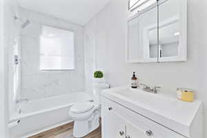 Gorgeous tile surround in main floor bathroom