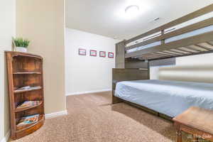 Bedroom featuring carpet