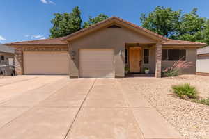 Ranch-style house with a garage