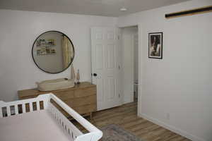 Bedroom featuring light wood-type flooring