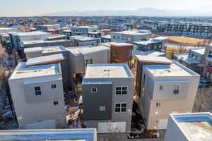 Birds eye view of property with a mountain view