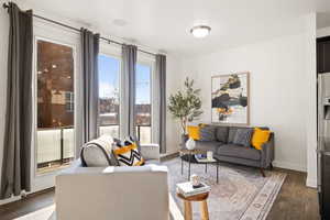 Living room featuring dark hardwood / wood-style floors