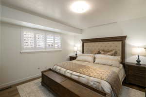 Primary Bedroom featuring hardwood / wood-style flooring