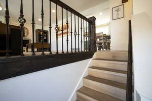 Staircase with hardwood / wood-style flooring