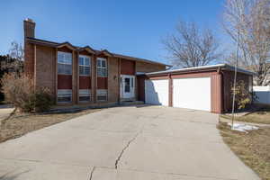 View of front of property with a garage