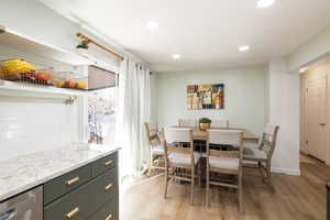 Dining area featuring light hardwood / wood-style floors