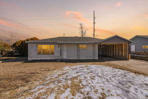 View of front of home featuring a carport