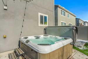 View of patio / terrace featuring a hot tub