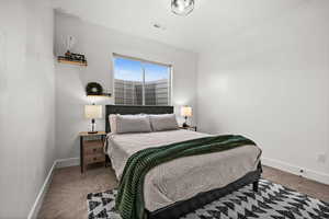 View of carpeted bedroom