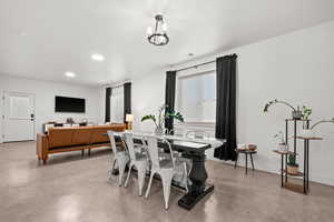 Dining area featuring a notable chandelier