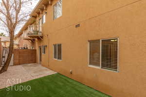 View of side of property featuring a patio area