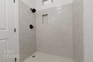 Bathroom with a tile shower