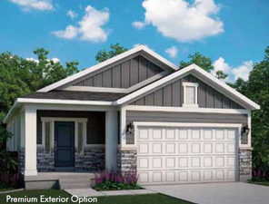 Craftsman inspired home featuring a garage and covered porch