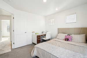 View of carpeted bedroom