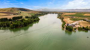 Bird's eye view featuring a water and mountain view