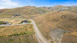 Property view of mountains with a rural view