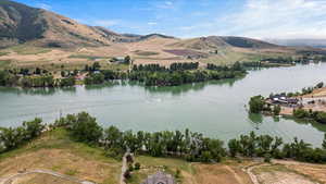 View of water feature with a mountain view