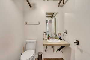 Bathroom with sink and toilet