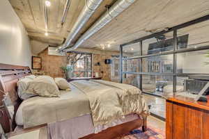 Bedroom with rail lighting