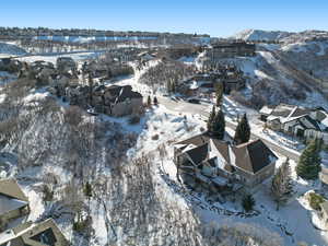 Snowy aerial view with a mountain view