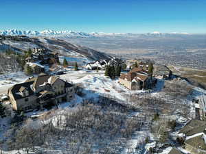 Snowy aerial view with a mountain view