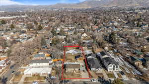 Birds eye view of property featuring a mountain view