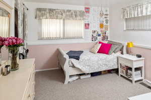 Bedroom featuring carpet