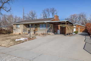 View of front facade featuring covered porch