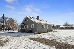 View of snow covered property