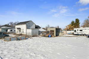 View of yard layered in snow