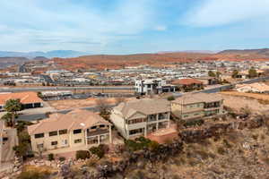 Birds eye view of property with a mountain view