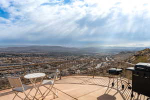 View of patio featuring a grill and a mountain view