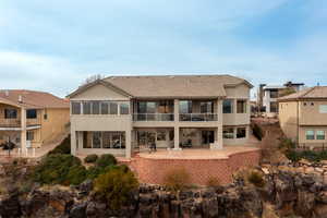 Back of property with a patio area