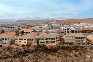 Birds eye view of property with a mountain view