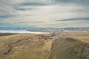 Aerial view with a water and mountain view