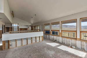 Interior space featuring a wealth of natural light and high vaulted ceiling