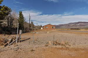 View of yard with a mountain view