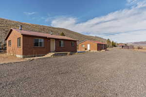 View of front of house with a mountain view